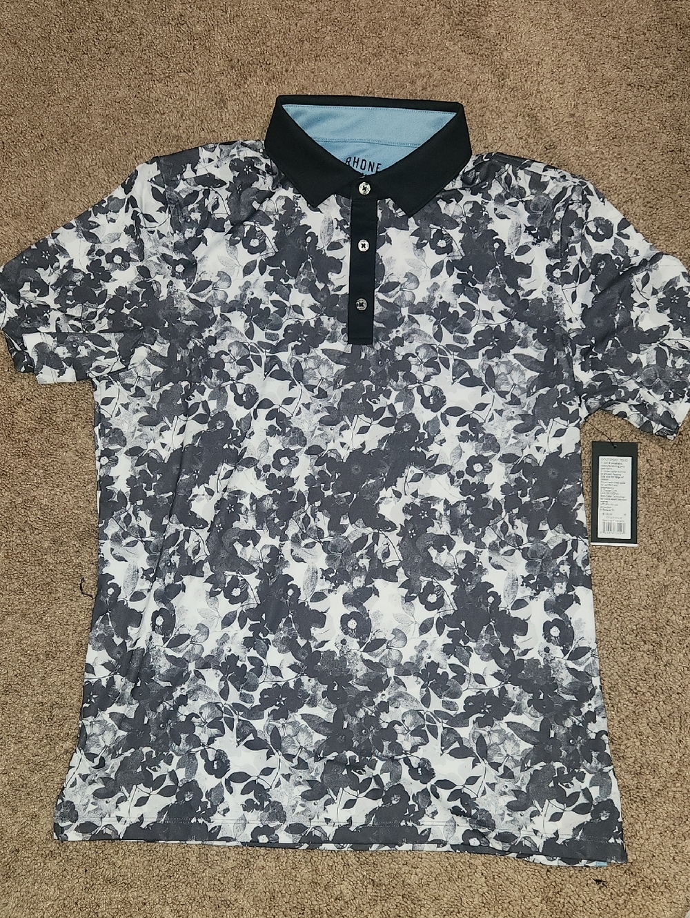 RHONE Golf Sport Polo Shirt in Black & White Flower PRINT